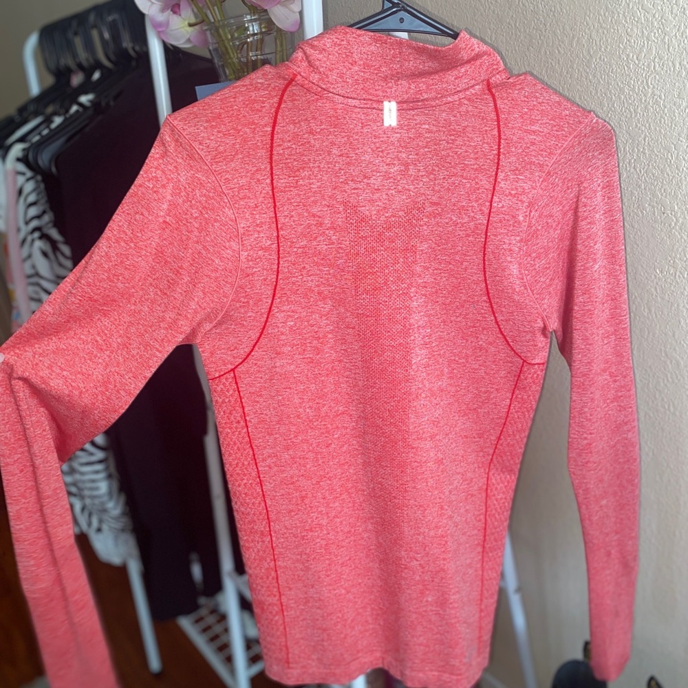 Lightweight Nike Dri-fit running sweater.